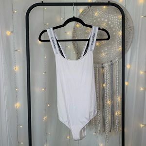 Calvin Klein white bodysuit with cross back straps size M